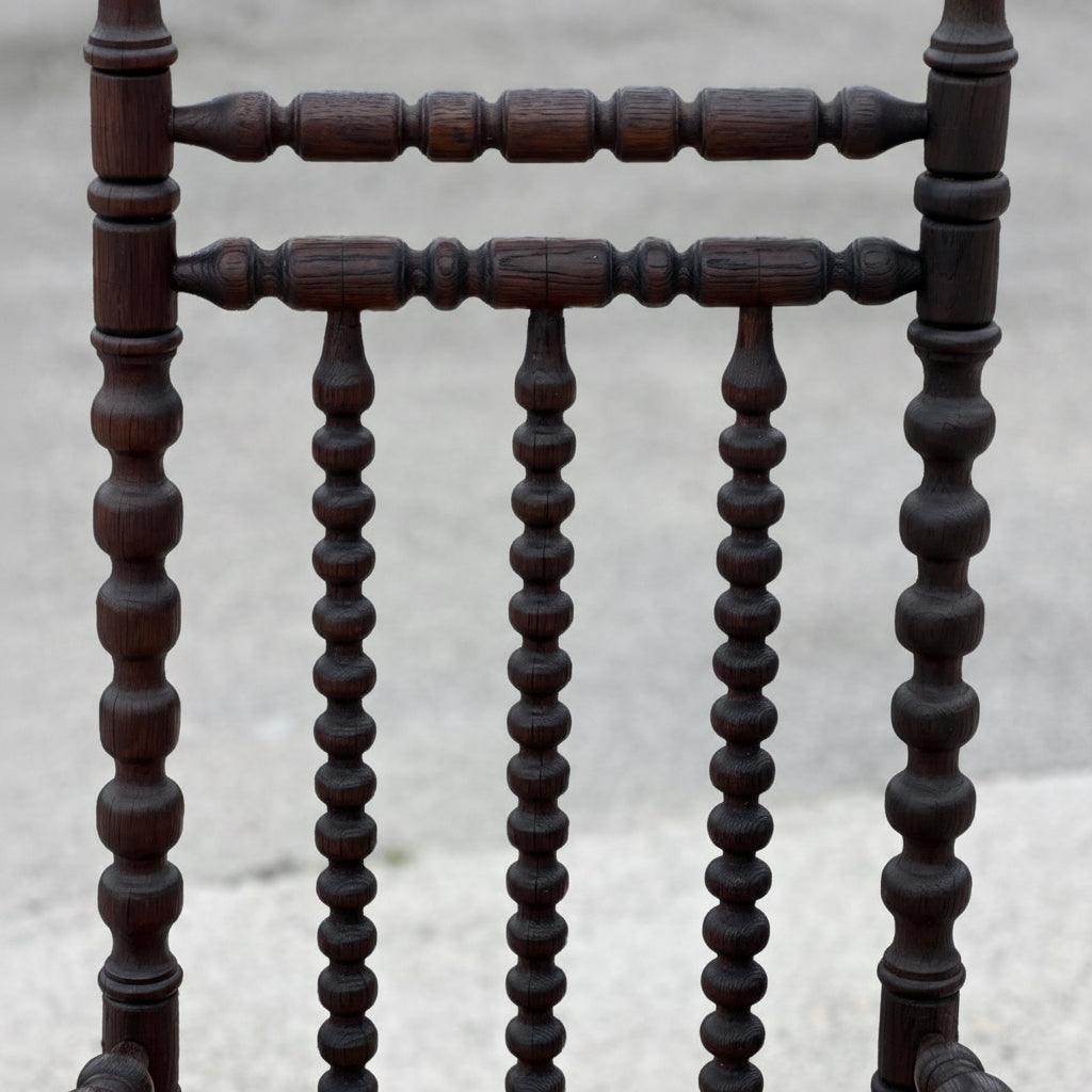 Fauteuil dit Bobbin en chêne teinté, 1930