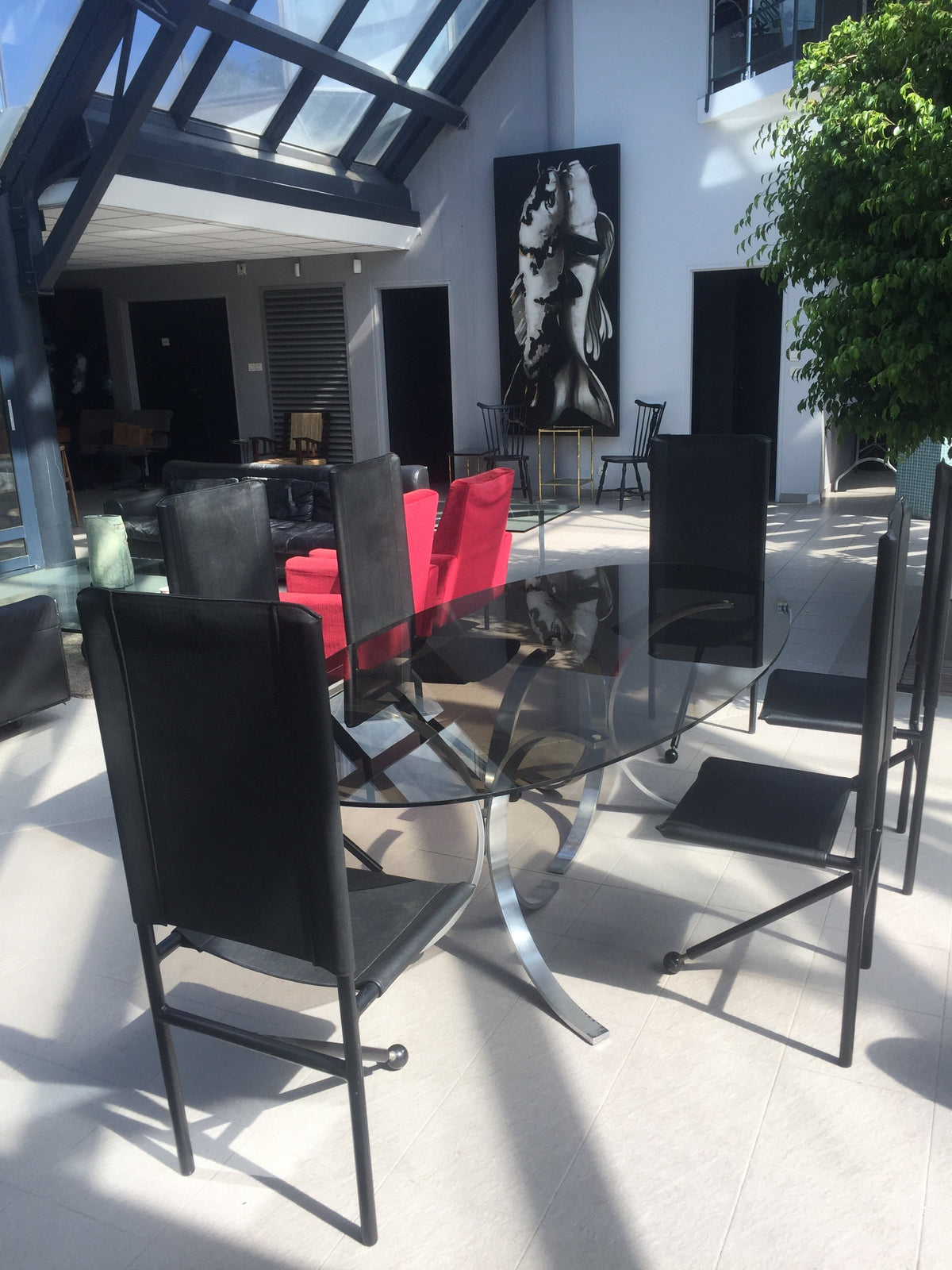 Ensemble de 6 chaises tripodes en cuir et métal 1970
